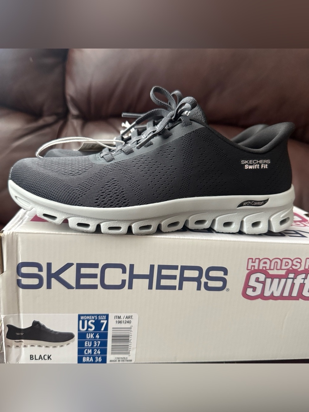 Skechers Swift Fit women’s Black and Light Gray Athletic Sneakers